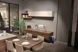 Cucina Stosa City rovere liquirizia, dettaglio dell'isola centrale con tavolo integrato