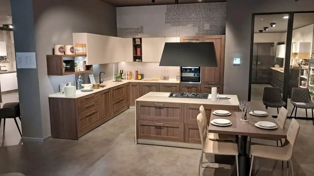 Cucina Stosa City con isola centrale e tavolo integrato in rovere liquirizia